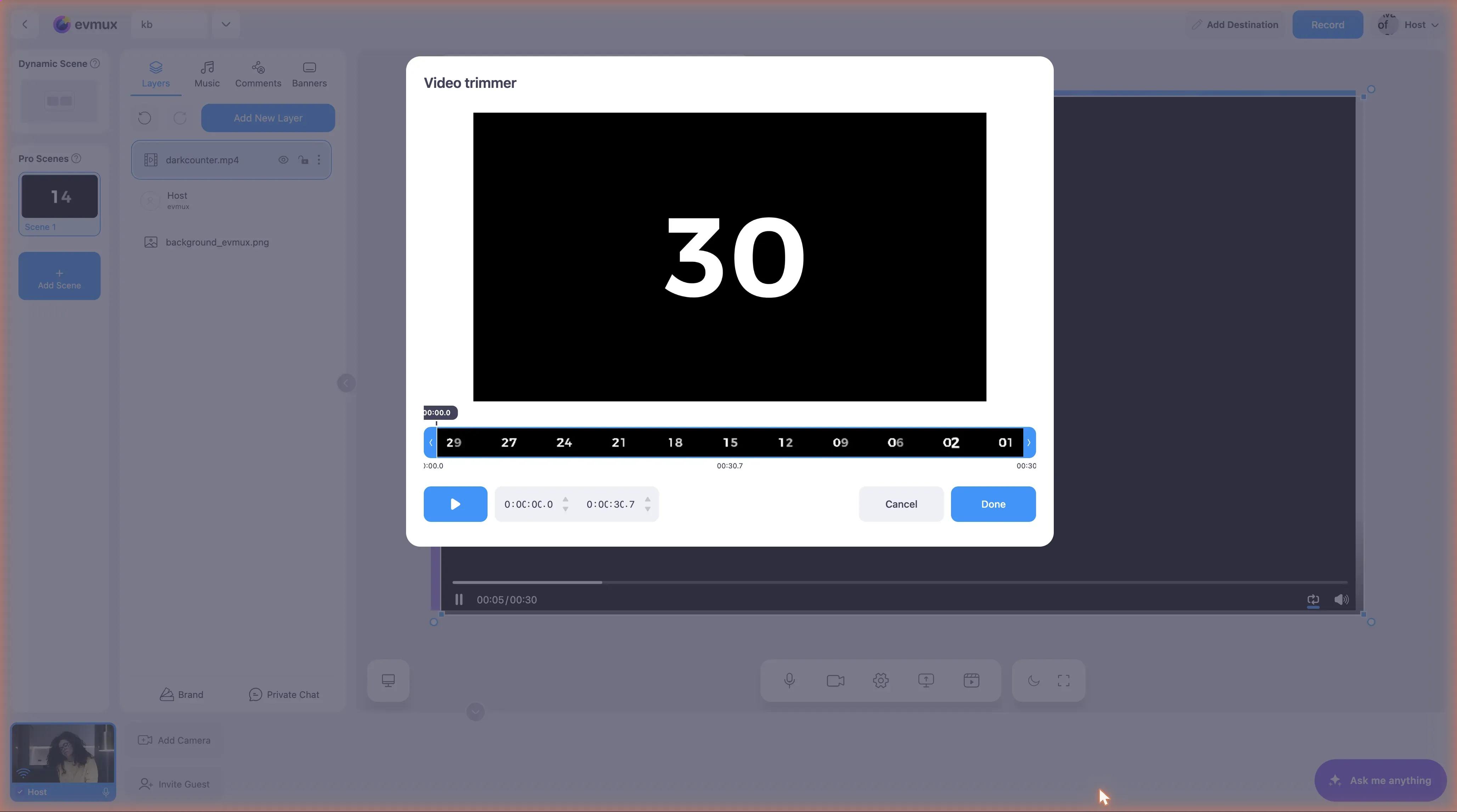 A janela Video trimmer: uma pré-visualização, uma linha do tempo com miniaturas e alças de início e fim, um botão de reproduzir, campos de hora de início e fim e os botões Cancel e Done